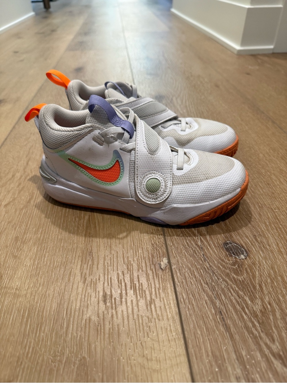 Nike Kids White Sneakers with Orange & Green Swoosh